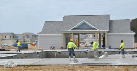 Professional Painters in Dubai Working on Wall